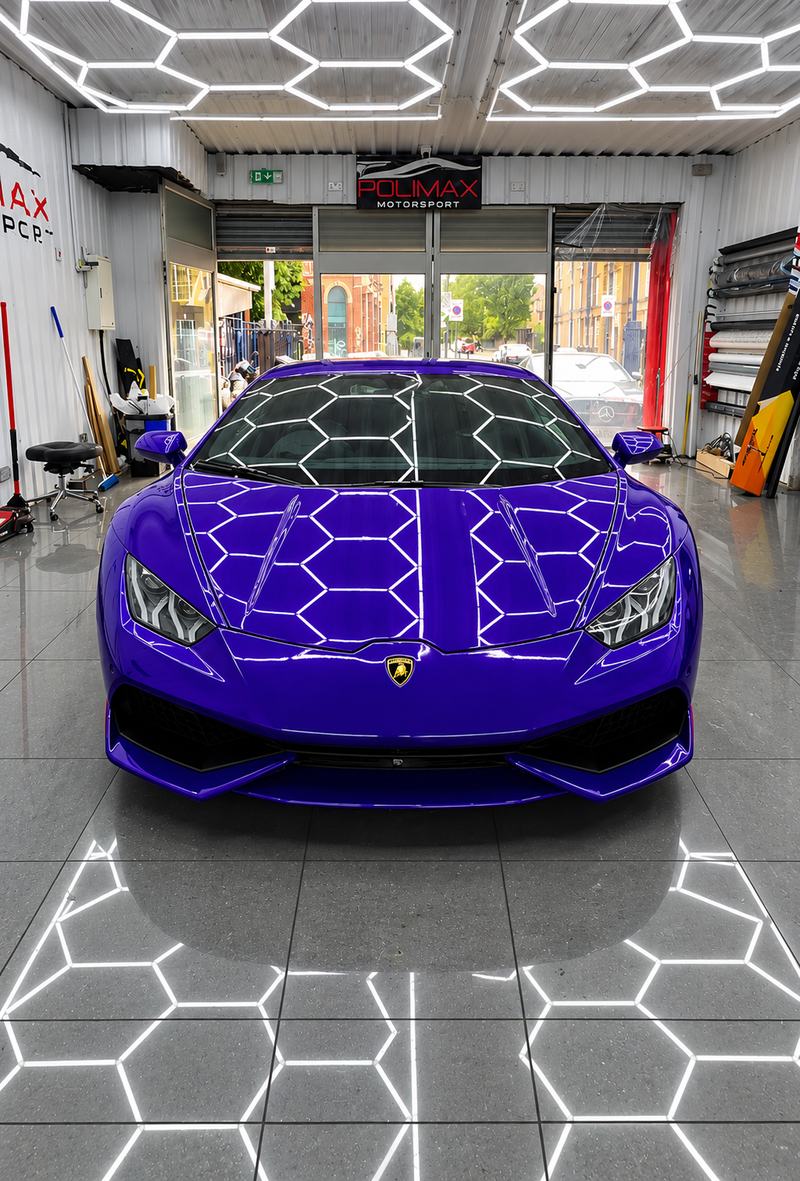 Purple Lamborghini Huracán in the Polimax studio under hexagon lighting